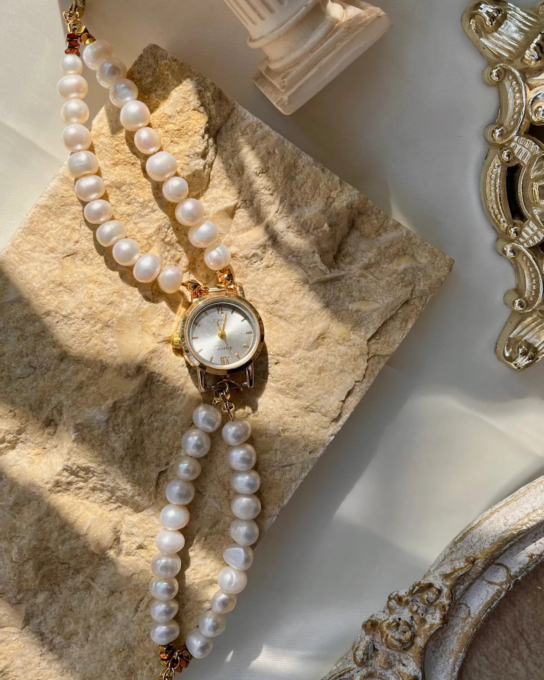 Double pearl watch