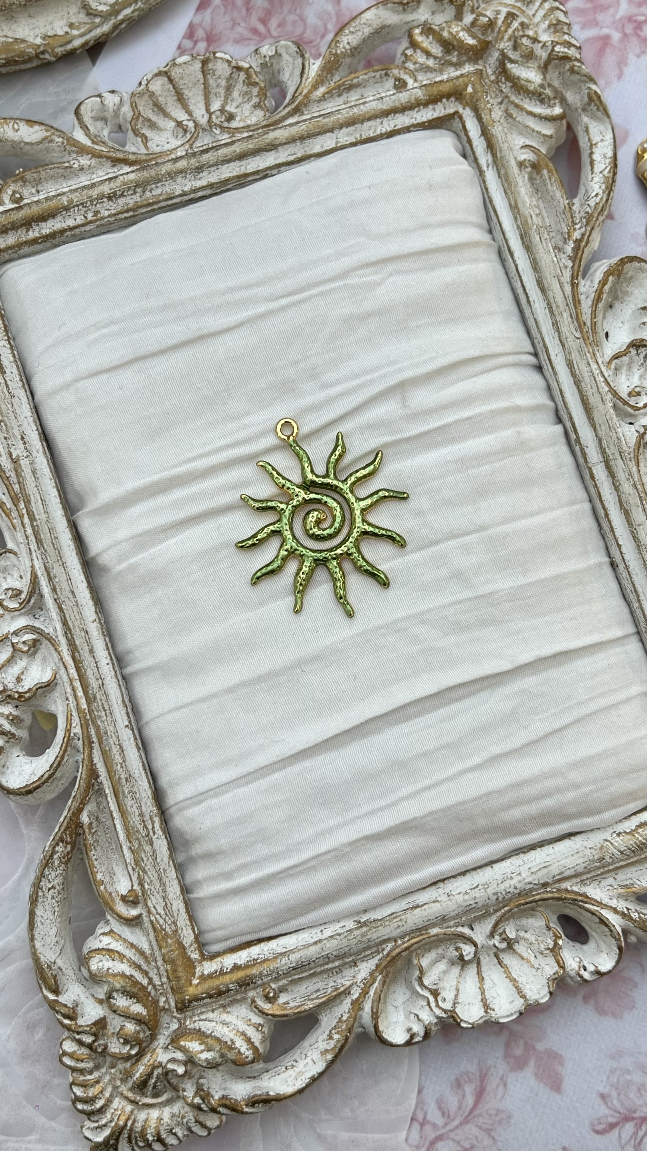 Sol charm in green