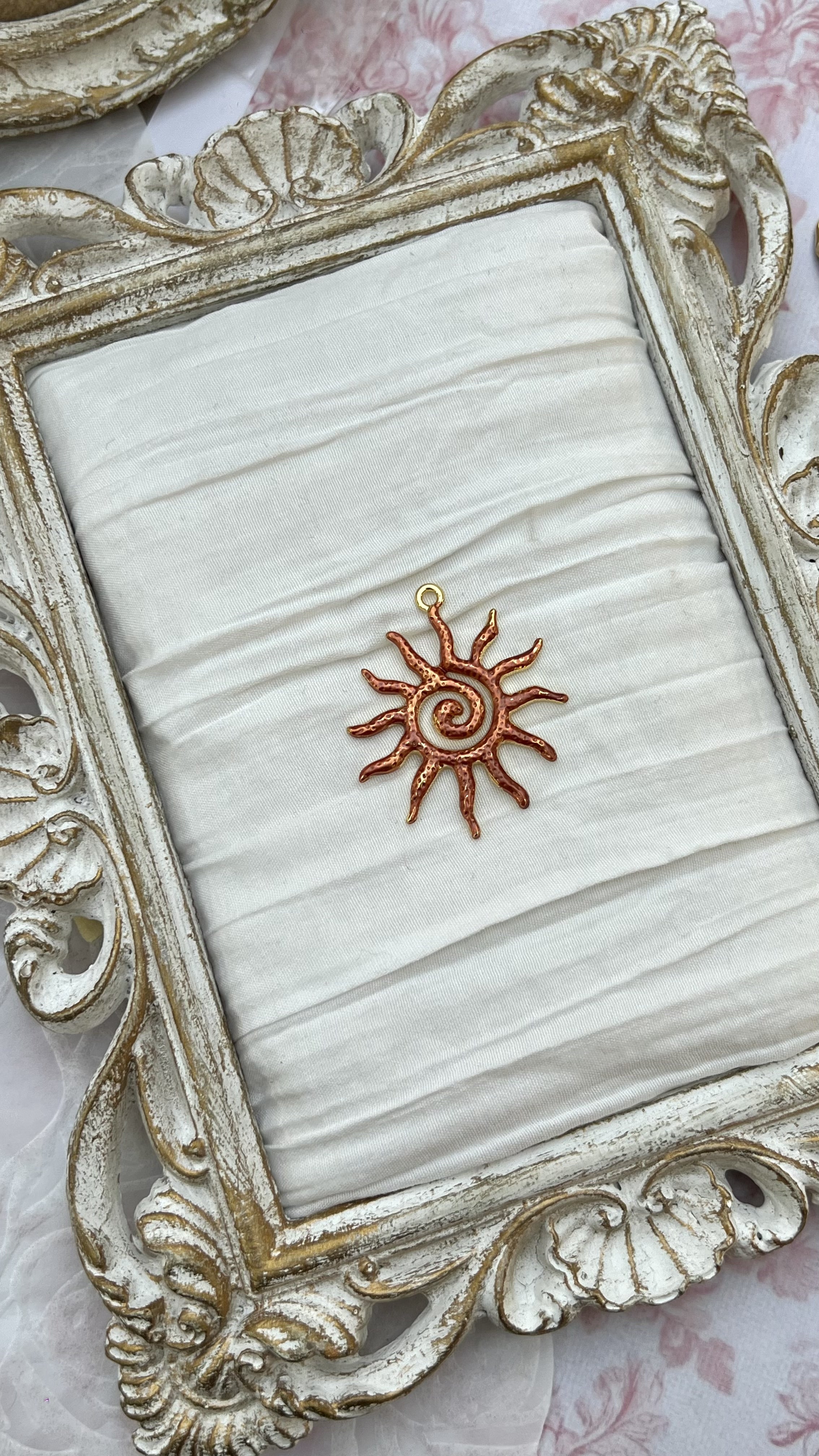 sol charm in orange